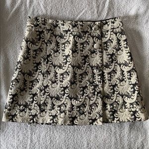 UO Cooperative Metallic Wrap Mini Skirt